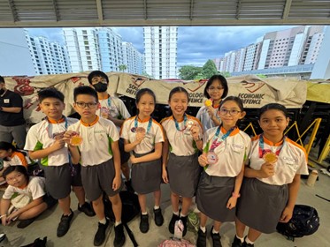 Rockwall Climbers with their National Primary Schools Sports Climbing Championships medals (NPSSCC)